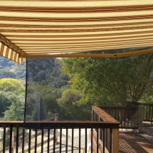 Verticle Drop Screen attached to a Sunesra Retractable Awning in Vallejo, CA